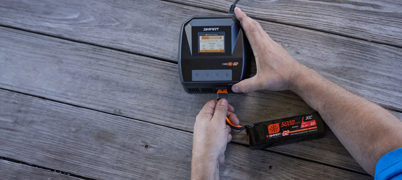 RC charging equipment on a workbench.