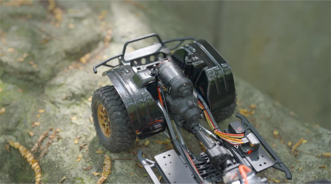 A Hobbywing Fusion Pro Elite installed in a crawler chassis outdoors.