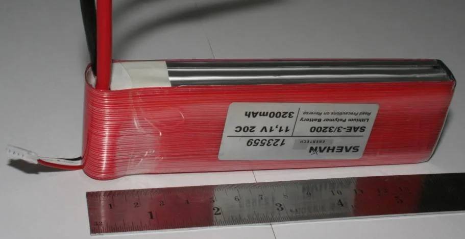 An 11.1-volt lithium-polymer pack with its leads and label.