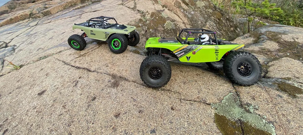An RC crawler driving on rocks at EuroCrawl 22.
