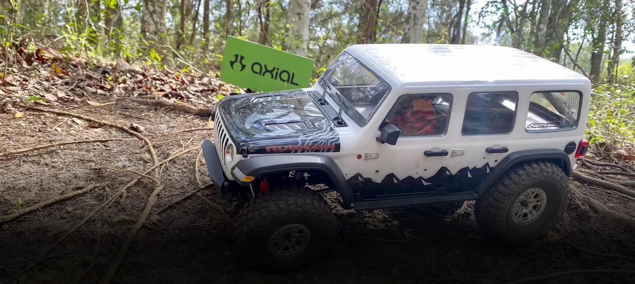 An RC scale truck climbing an event obstacle at Ultimate Scale Truck Expo 2023.
