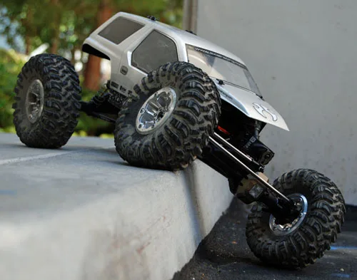 Completed Axial crawler articulating over a curb